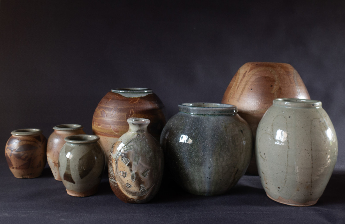 A selection of wood and soda fired bottles and jars